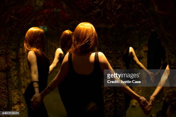 woman dancing in a circle with her own reflections - schamane stock-fotos und bilder