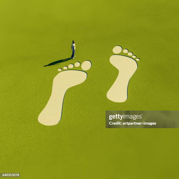 footprints in the grass - green footprint stock pictures, royalty-free photos & images