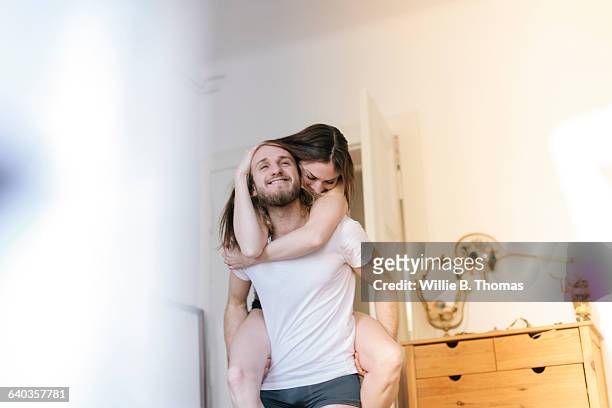 Couple being playful in Bedroom