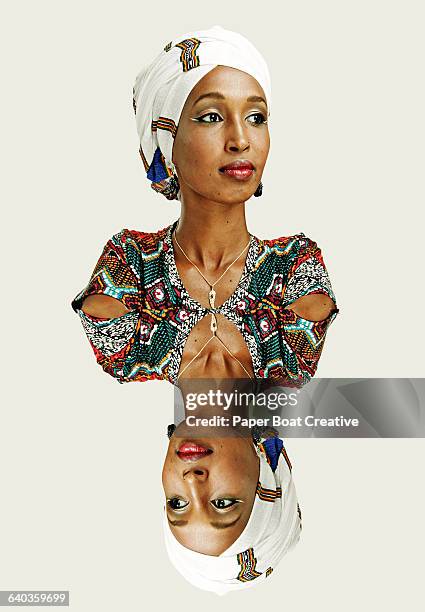 double portrait of an ethiopian lady in studio - immagine riflessa foto e immagini stock