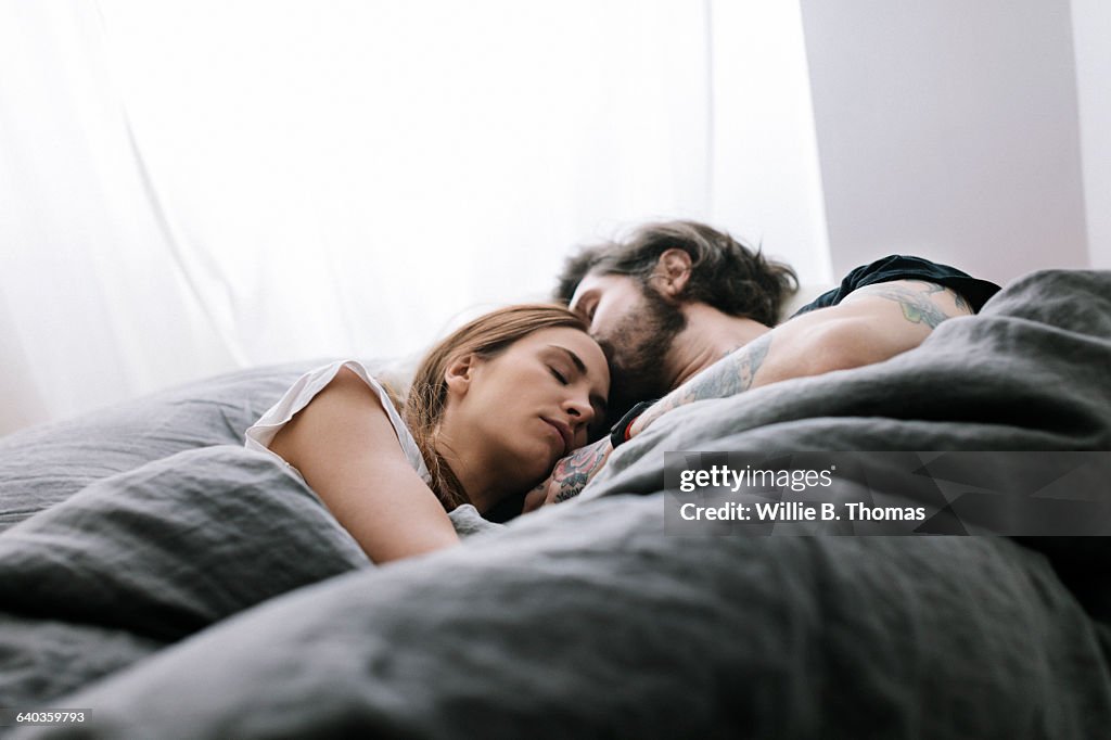 Couple sleeping in Bed together
