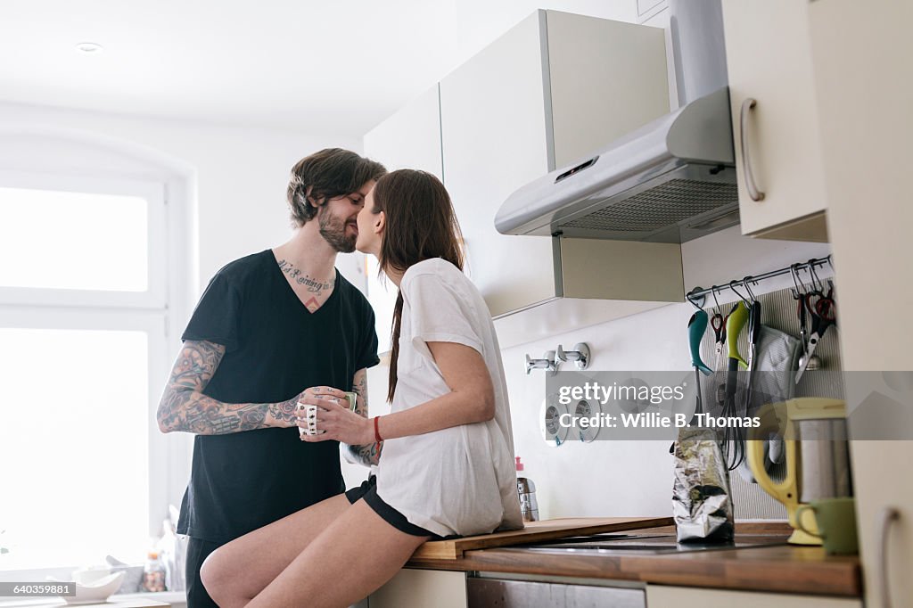Morning romance in the kitchen
