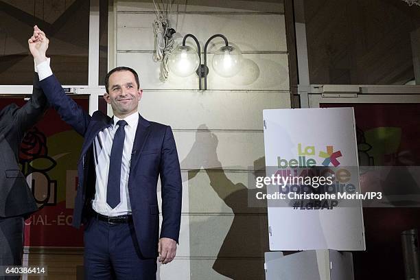 Candidates for the 2017 French Presidential Election, Benoit Hamon and Former Prime Minister Manuel Valls , greet each other after the results of the...