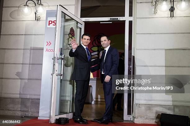 Candidates for the 2017 French Presidential Election, Benoit Hamon and Former Prime Minister Manuel Valls , greet each other after the results of the...