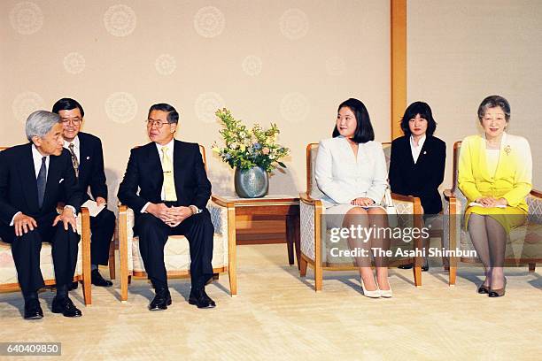 Peruvian President Alberto Fujimori and Emperor Akihito talk while Keiko Fujimori and Empress Michiko talk during their meeting at the Imperial...