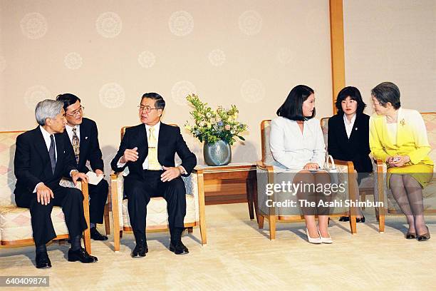 Peruvian President Alberto Fujimori and Emperor Akihito talk while Keiko Fujimori and Empress Michiko talk during their meeting at the Imperial...