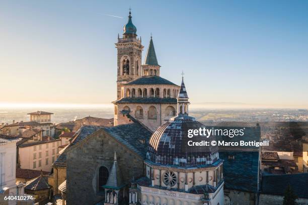 bergamo, lombardy, italy. view of the cityscape and saint mary major basilica. - bergamo stock pictures, royalty-free photos & images
