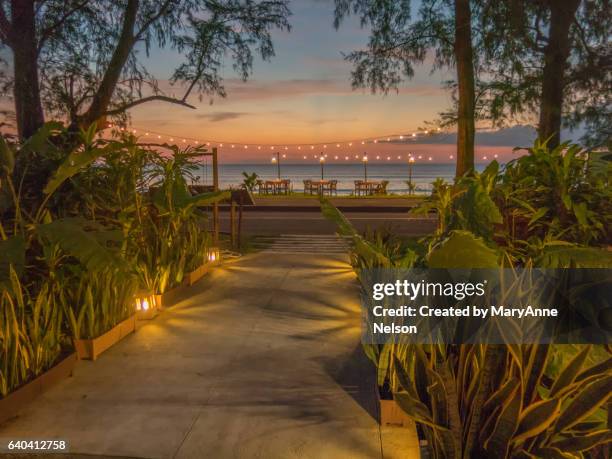 walkway to the beach at sunset - khao lak stock pictures, royalty-free photos & images