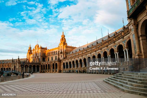tower of the plaza of spain in seville - seville stock pictures, royalty-free photos & images