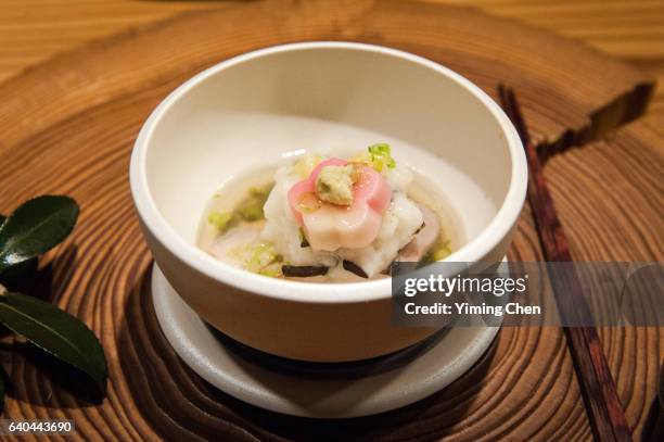 japanese cuisine: steamed tilefish with turnip - nimono stock pictures, royalty-free photos & images