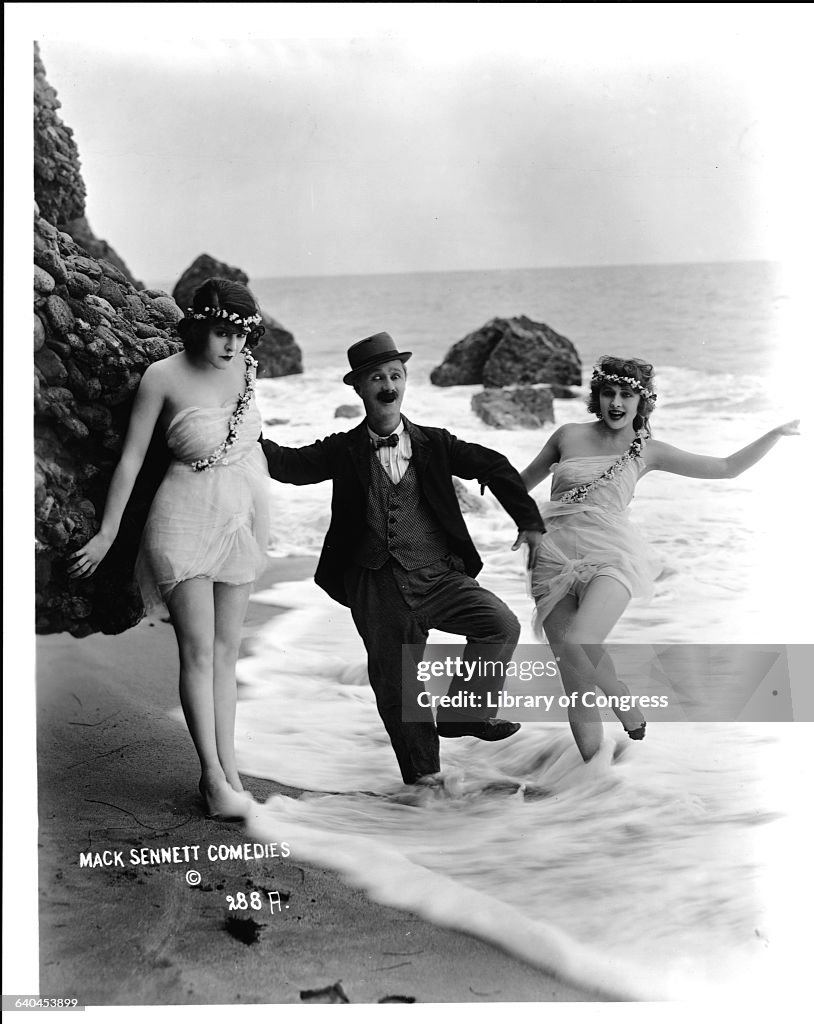 Actor Ben Turpin with Women Frolicking in Surf