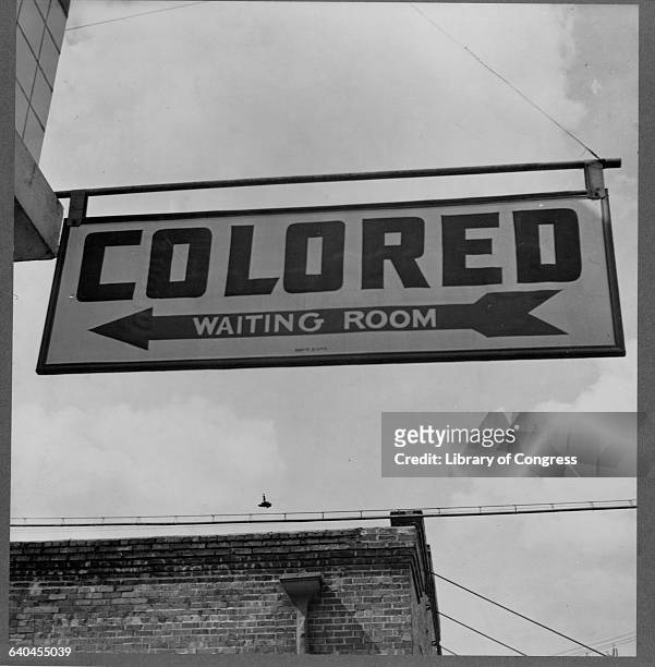 Sign at a Greyhound Bus Station Reading "Colored Waiting Room"