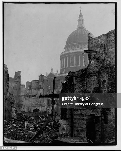 The dome of St Paul's Cathedral stands over buildings destroyed in the bombing of London.