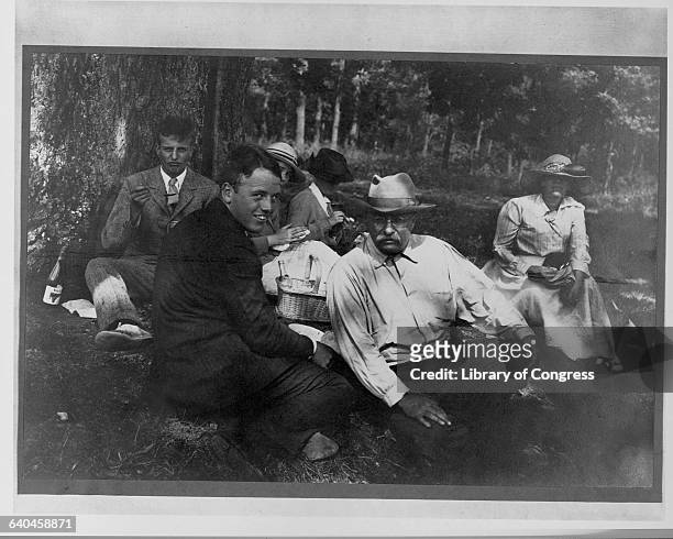 Teddy Roosevelt relaxes on a picnic with his family.