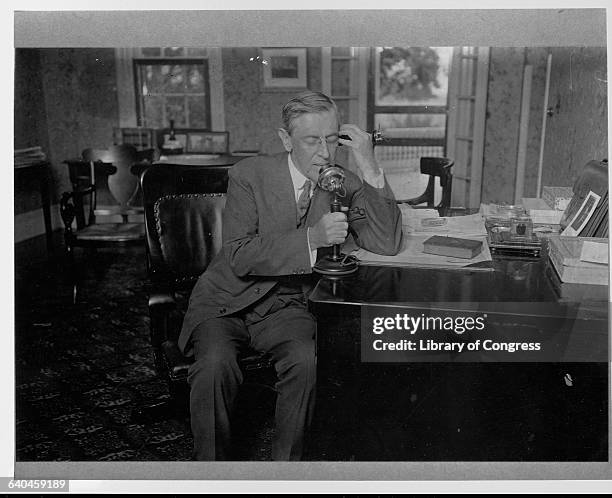 President Woodrow Wilson Speaking on Telephone