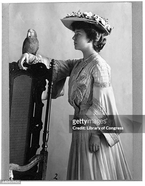 Alice Roosevelt Longworth Holding Parrot on Arm