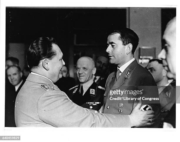 Hermann Goering clasps the arms of Nazi armaments minister and architect Albert Speer.