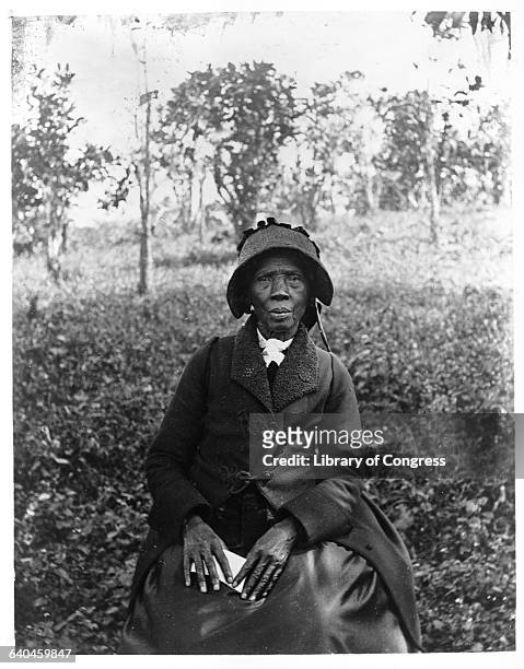 An ex-slave returned to Liberia, Martha Rix poses for a portrait.