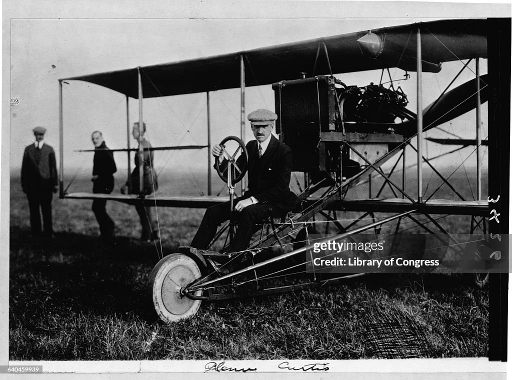 Pilot Glenn H. Curtiss Seated in Biplane