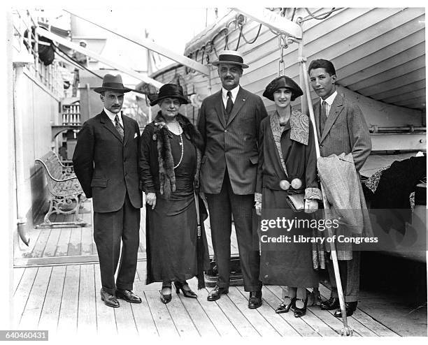 American banker and financier Amadeo Peter Giannini with his family on an ocean liner. From left to right, son L.M. Giannini, wife Clorinda, A.P....