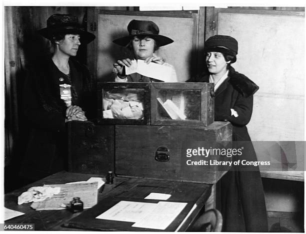 Three women vote at a polling station in New York City, New York, USA.