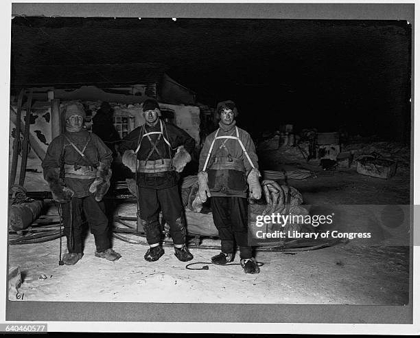 Members of Captain Robert Falcon Scott's 1910 Antarctic expedition stand outside of their hut.
