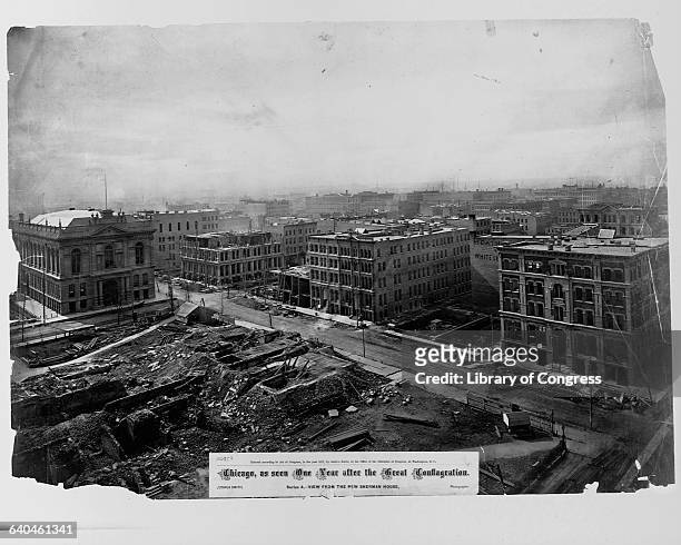 One year after the Great Chicago Fire, some structures are being rebuilt. 1872.