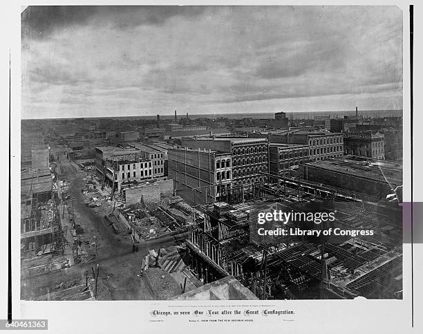 One year after the Great Chicago Fire, some structures are being rebuilt. 1872.