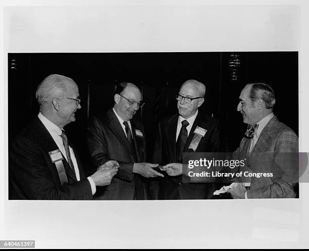 William Shockley, John Bardeen, and Walter Brattain, the three Bell Labratory physicists who invented the transistor, a device that amplifies,...