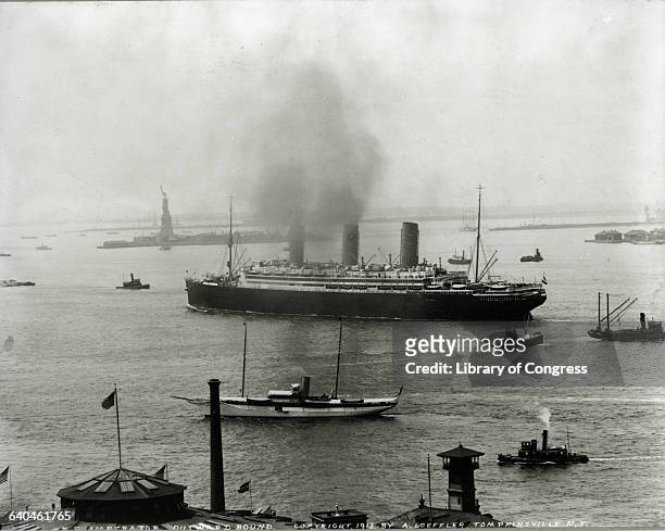 The ocean liner, S.S. Imperator, heads out of Upper New York Bay to the Atlantic Ocean. Ca. 1913, New York.