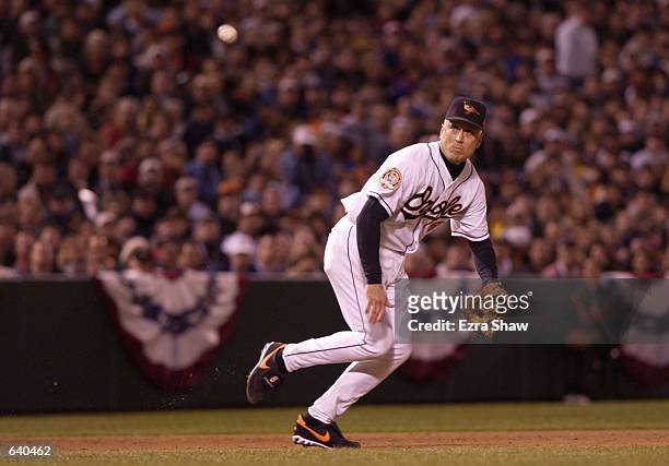 Cal Ripken Jr. #8 of the Baltimore Orioles tries to make a play on the ball in the last game of his career at Camden Yards in Baltimore, Maryland....
