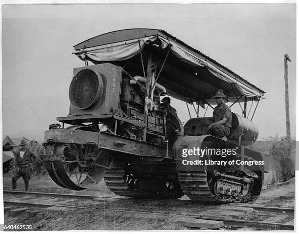 Soldiers driving a Holt caterpillar tractor in the U.S. Army camp, during the United States Army Punitive Expedition to Mexico in search of...