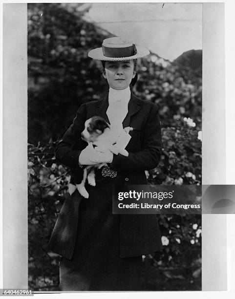 Alice Roosevelt Longworth Holding Puppy