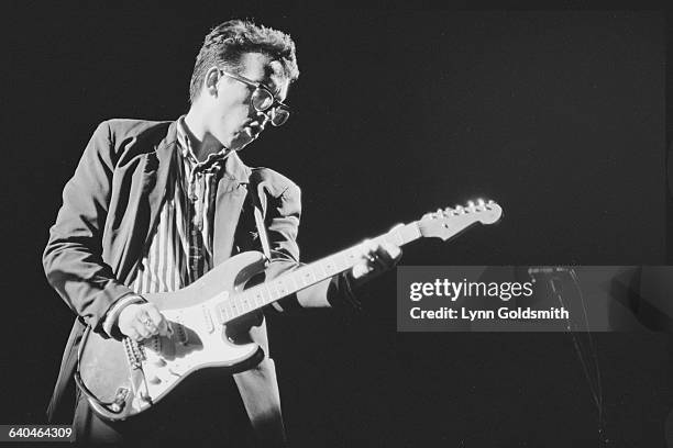 Elvis Costello Playing His Guitar