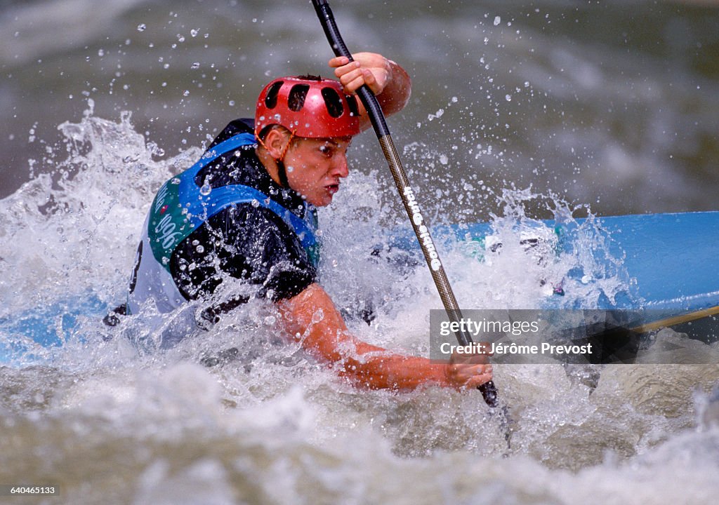 Man Kayaking in the Olympic Games