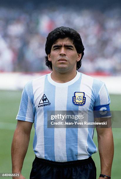 Diego Maradona, the Argentine soccer captain, listens to national anthems being played before the start of a World Cup match.