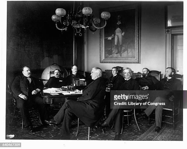 Left to right are, President Grover Cleveland; Charles S. Fairchild, Secretary of the Treasury; William C. Whitney, Secretary of the Navy; Augustus...