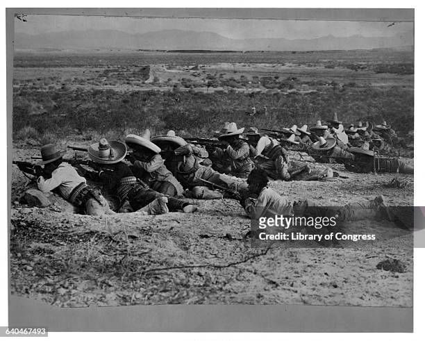 Soldiers under the command of Pancho Villa in the trenches during the Mexican Revolution.