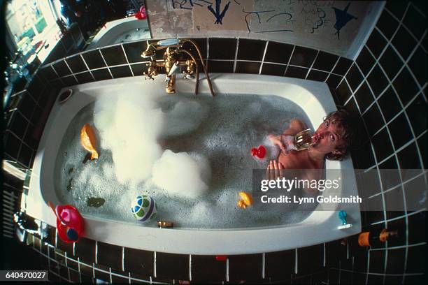 Andy Summers of The Police Drinking Wine in the Bathtub