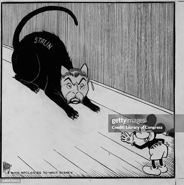 Tito, protrayed as Mickey Mouse, thumbs his nose at Stalin, portrayed as a cat.