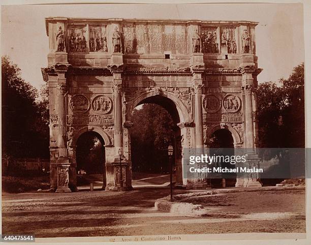 Arch of Constantine, a triumphal arch in Rome, Italy, commemorating Constantine's victory over Maxentius at Saxa Ruba. Photographed ca. 1890. It is a...