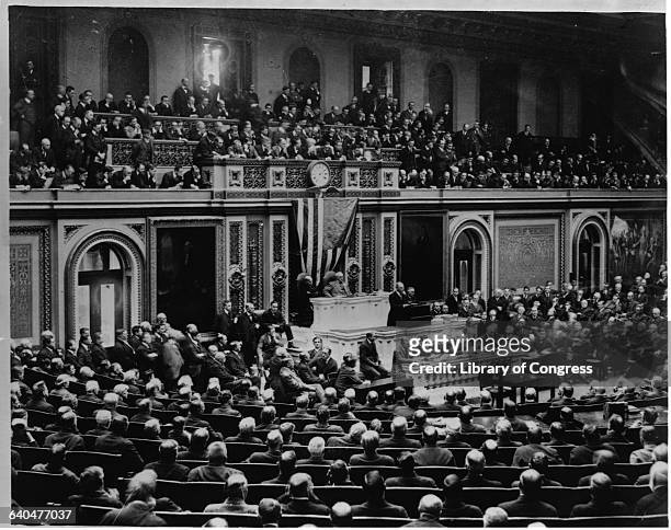 President Woodrow Wilson, the 28th President of the United States, addresses Congress on April 2, 1917 requesting a declaration of war against...