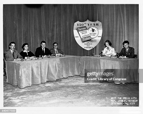 Left to right are, interviewers Ernest K. Lindley, May Craig, James Reston, and Lawrence Spivak, moderator Martha Rountree, and a young John F....