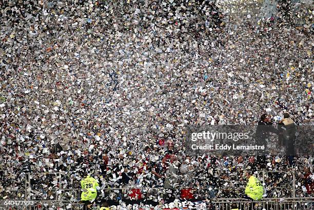 French Soccer Championship, Season 2003-2004. Lyon Olympic vs Nice . Illustration supporters. A shower of paper floats on to the Lyon fans after the...