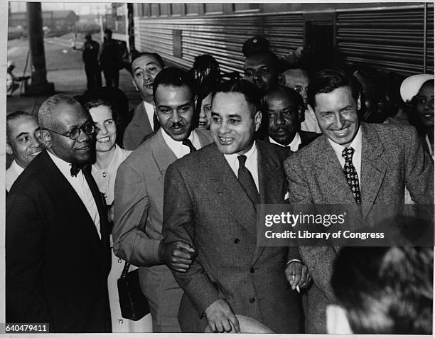 Ralph J. Bunche and Roy Wilkens in a Crowd