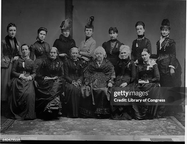 Longtime women's rights activist Elizabeth Cady Stanton, front row, fourth from left, sits with executive committee members from the International...