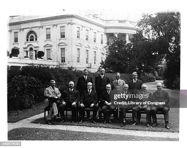 Portrait of President Calvin Coolidge and his cabinet on the White House grounds. September 11, 1923. | Location: White House grounds, Washington D....
