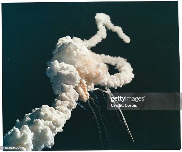Thick cloud of engine exhaust, solid rocket booster plume, and expanding gas fill the sky above the Kennedy Space Center in Florida after the...