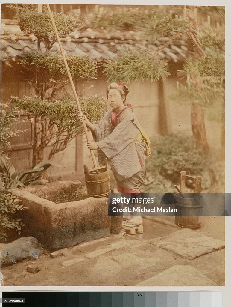 Japanese Woman With Mop