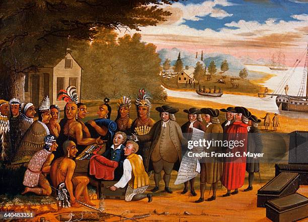 English Quaker leader and founder of Pennsylvania colony, William Penn, establishes friendly relations with Native American tribes during his visit...